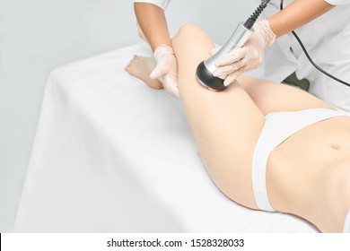 Cavitation Rf Body Treatment. Female Ultra Sound Lipo Machine. Spa Contouring. Doctor Hands.