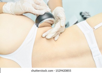 Cavitation rf body treatment. Female ultra sound lipo machine. Spa contouring. Doctor hands. - Shutterstock ID 1529420855
