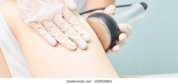 Cavitation Rf Body Treatment. Female Ultra Sound Lipo Machine. Spa Contouring. Doctor Hands.