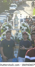 Cavite, Philippines - 08 Dec 2019: People Carrying The Statue Of Virgin Marry On The Feast Of Immaculate Conception