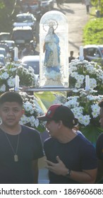 Cavite, Philippines - 08 Dec 2019: People Carrying The Statue Of Virgin Marry On The Feast Of Immaculate Conception