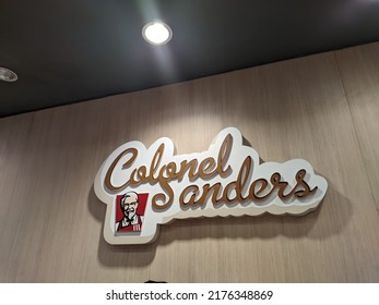 CAVITE, PHILIPPINES - July 9, 2022: Colonel Sanders inside a KFC restaurant in a shopping mall in the Philippines.