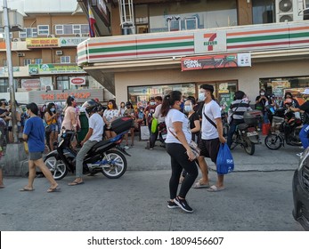 CAVITE, PHILIPPINES - SEPTEMBER 6, 2020: People Swarm The Streets Amidst The 
Pandemic. 