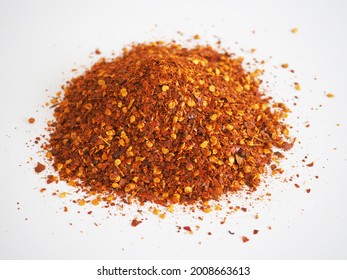 Cayenne Pepper On White Background. Top View Photo, Blurred.