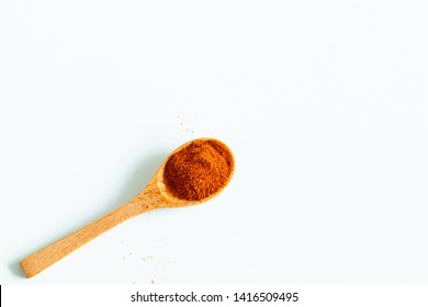 Cayenne Pepper In Wood Spoon Isolate On White Background.