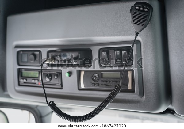 CB radio and car stereo in the truck cabin\
close up background.