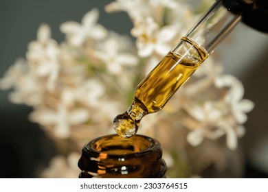 CBD Oil. Cannabis sativa extract. THC. Essential oils. Lilac flower.