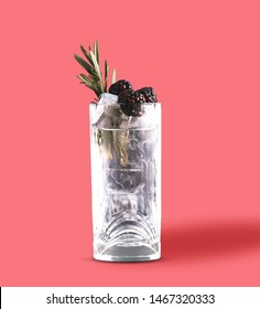 CBD Oil Gin And Tonic In Highball On Pink Background