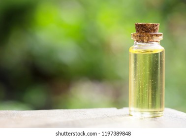  CBD oil on wood background, Cannabis Oil - medical marijuana concept