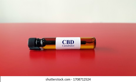 CBD Oil Synthesis From Canabis Leaf. Cannabis (marijuana) Is A Psychoactive Drug Used For Medical Purpose As  Treatment For Cancer, Parkinson Disease, Seizure And Glaucoma. Medical CBD Drug Concept 