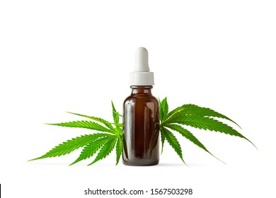 CBD Oil or THC Oil in Glass Bottle with Hemp or Medical Cannabis Plant Leaves Isolated on White Background 