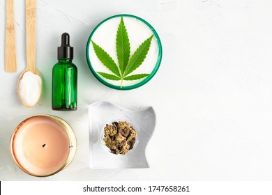 CBD Skin Cream Made From Cannabis Extract For An All Natural Skincare Treatment. Overhead Photography Flat Lay With Cannabis Leaf And CBD Oil.