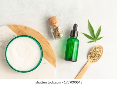 CBD Skin Cream For The Treatment Of All Types Of Topical Conditions Including Rosacea, Eczema And Inflammation. Cannabis Leaf, Tincture And Hemp Seed. CBD Skincare.