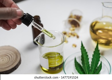cbd thc oil medical treatment in doctor laboratory. natural medicine on clinical research . top view.