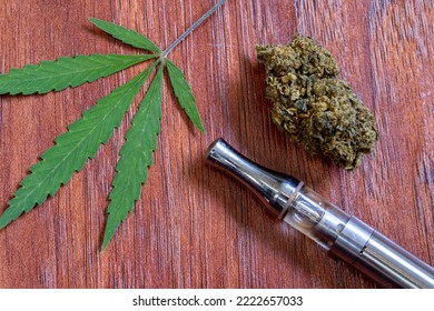 CBD Vaporizer With A Cannabis Leaf And Weed