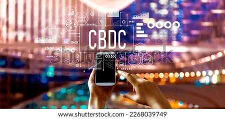 CBDC - Central Bank Digital Currency Concept with big city lights at night
