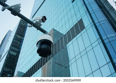 CCTV Camera With Modern Financial Buildings In Downtown, Property And Financial Security Concept.                  