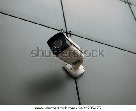 CCTV camera. Security camera on the wall, CCTV on the buildings monitoring the street.