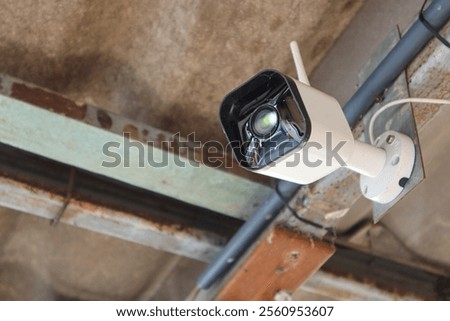 CCTV camera. Security camera on the wall
