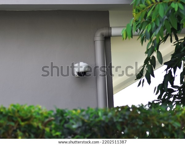 CCTV camera\
surveillance system outdoor of\
house.