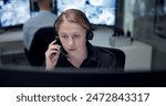 CCTV, headset and security with woman in control room for law enforcement or surveillance. Call, communication and safety with police officer at headquarters for crime, inspection or privacy