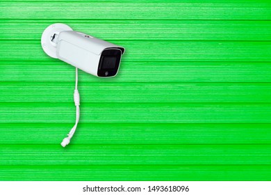 CCTV IP Camera ready to Install on green wall
