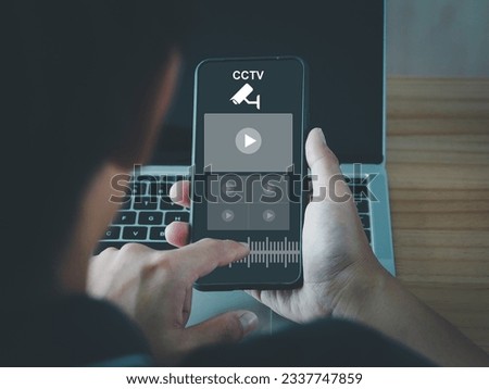 CCTV on smartphones. Users who are watching safety from outside the home. through modern surveillance cameras For the security of living on a virtual window