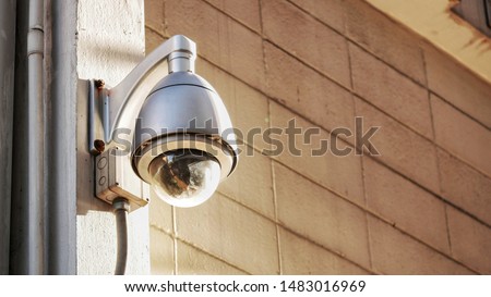 CCTV on the wall of the building. The public security CCTV camera is a growing problem for cities worldwide. Smart cities are, as a concept, safer cities. closed circuit camera.