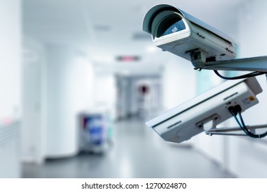 The CCTV Security Camera operating in hospital blur background.