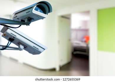 The CCTV Security Camera operating in hospital blur background.