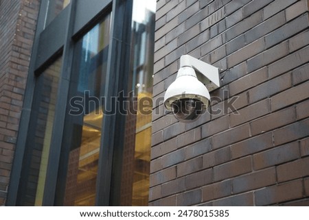 CCTV security camera operating outdoor 