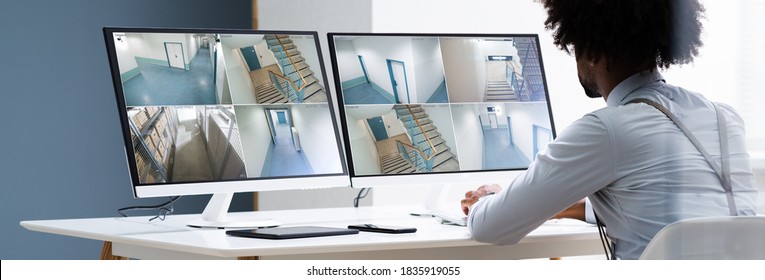 CCTV Security Footage On Multiple Computer Monitors