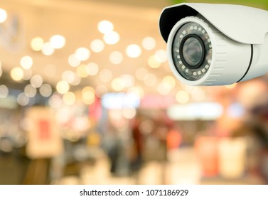 CCTV Security With Shop Store Blurry Background.