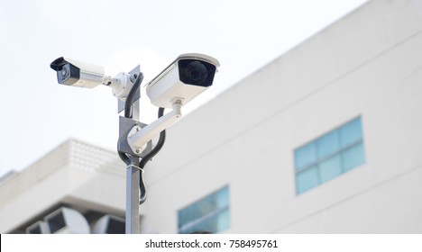 CCTV Surveillance Security Camera Video Equipment On Pole Outdoor Building Safety System Area Control And Copy Space