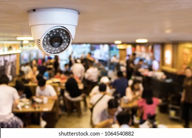 CCTV system security inside of restaurant.Surveillance camera installed on ceiling to monitor for protection customer in restaurant