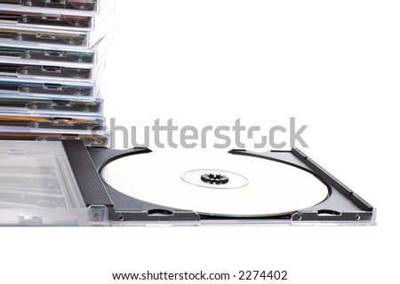 CD box open ahead of cds stack over a white background