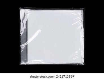 CD case on black background. Isolated transparent disk mockup. Clean cover box template.