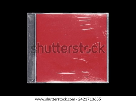 CD case on black background. Isolated transparent disk mockup. Clean cover box template.