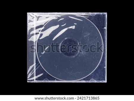 CD case on black background. Isolated transparent disk mockup. Clean cover box template.