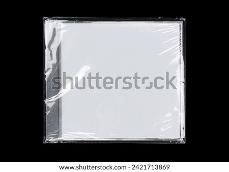 CD case on black background. Isolated transparent disk mockup. Clean cover box template.