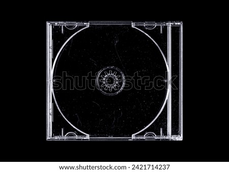 CD case on black background. Isolated transparent disk mockup. Clean cover box template.