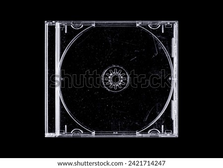 CD case on black background. Isolated transparent disk mockup. Clean cover box template.