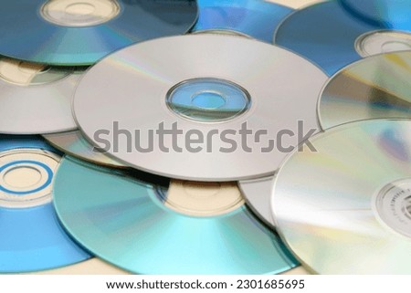 CD. CDs. Digital file storage system. Writable disk for computers. Digital file reader. Compact disc. Optical disc. Compact Disc Recordable.