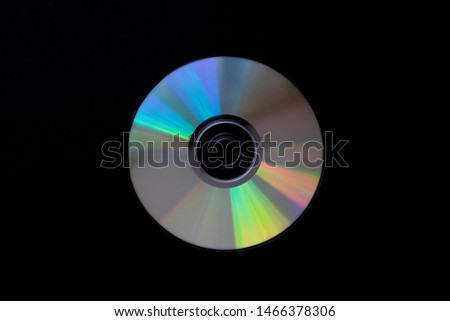 cd compact disc on dark black background top view  with copy space  close-up