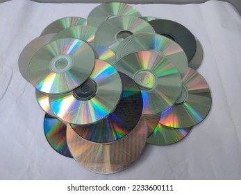 CD or compact disc is a round disc made of metal or plastic coated with a material that can be electrified, so it is magnetic. CDs also store data