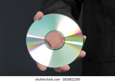 CD or DVD. Black Background.
