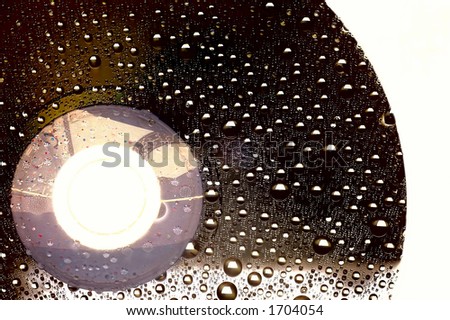 CD DVD disk with some droplets
