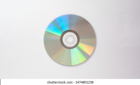 CD on a light gray background close-up