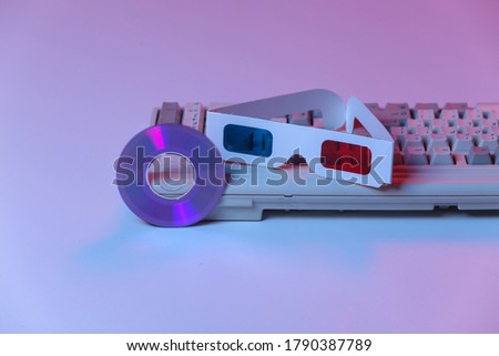 CD with, 3d glasses, old pc keyboard. Pink blue gradient neon, holographic light. Retro wave. Attributes 80s