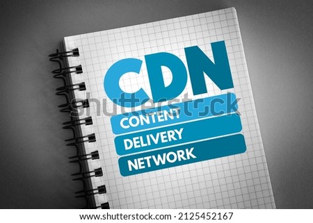 CDN - Content Delivery Network is a geographically distributed network of proxy servers and their data centers, acronym concept on notepad